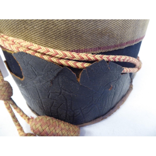 71 - A mid 19thC Gloucestershire Hussars shako with a hide liner(Please Note: this lot is subject to the ... 