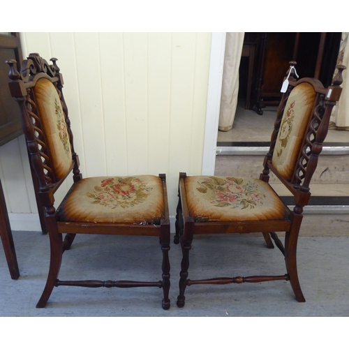 72 - A pair of 19thC rosewood framed drawing room chairs of diminutive proportions, each with an arched (... 