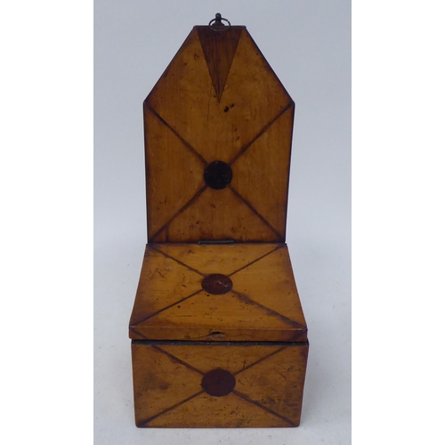 80 - An early 19thC treen satinwood wall hanging salt box with an extended backplate, over an angled hing... 