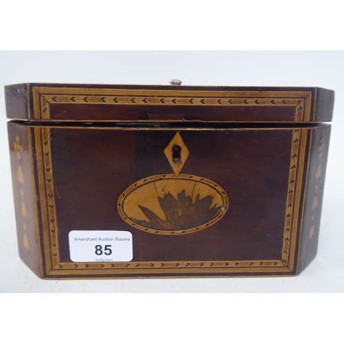 85 - An early 19thC mahogany and marquetry, elongated, octagonal tea casket with straight sides and a hin... 