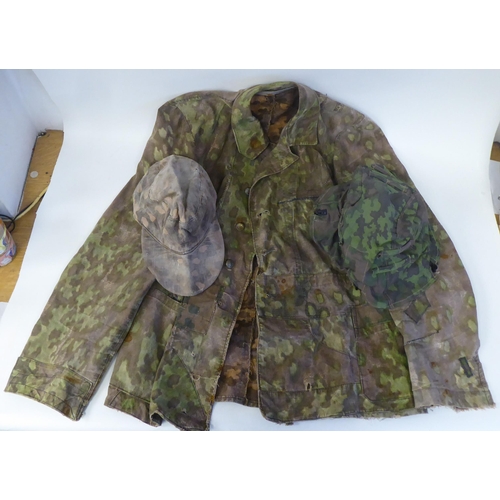 91 - A German military camouflage smock, cap and helmet cover(Please Note: this lot is subject to the sta... 