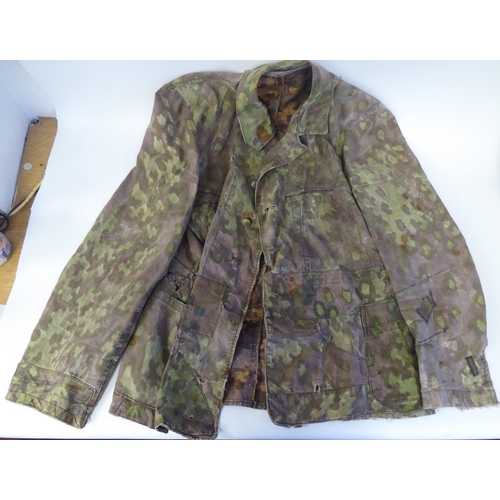 91 - A German military camouflage smock, cap and helmet cover(Please Note: this lot is subject to the sta... 