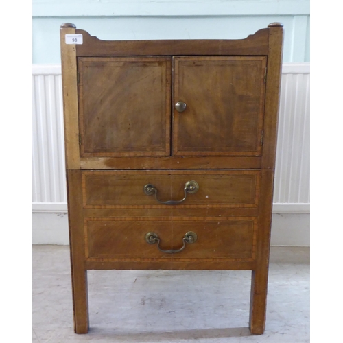 98 - An early 19thC crossbanded and string inlaid mahogany night commode, the galleried tray top with cut... 