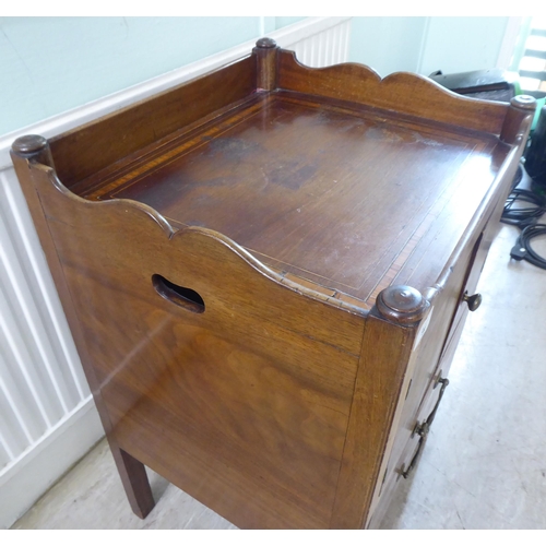 98 - An early 19thC crossbanded and string inlaid mahogany night commode, the galleried tray top with cut... 