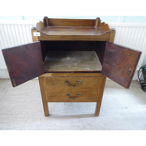 98 - An early 19thC crossbanded and string inlaid mahogany night commode, the galleried tray top with cut... 