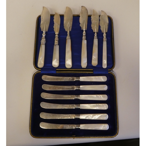 136 - A set of six silver dessert knives, on mother-of-pearl handles  cased; and a matched set of contempo... 