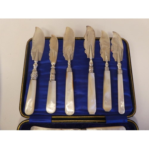 136 - A set of six silver dessert knives, on mother-of-pearl handles  cased; and a matched set of contempo... 