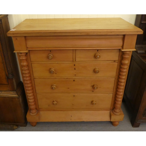 102 - An early 20thC Scottish design, bleached pine six drawer dressing chest, on a plinth and turned feet... 