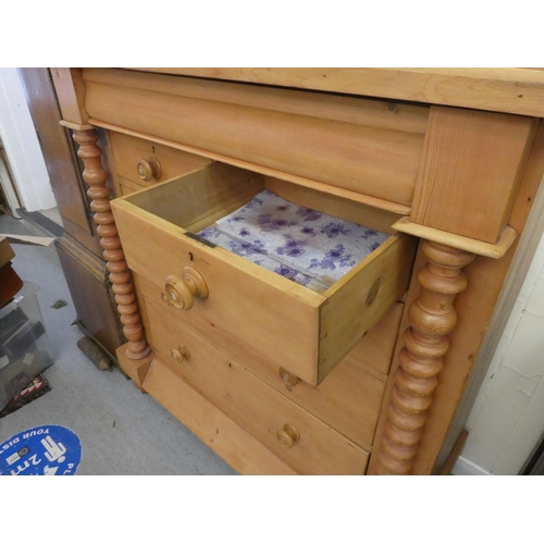 102 - An early 20thC Scottish design, bleached pine six drawer dressing chest, on a plinth and turned feet... 