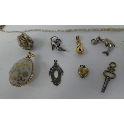 106 - Items of personal ornament: to include a circular pendant  stamped 375 