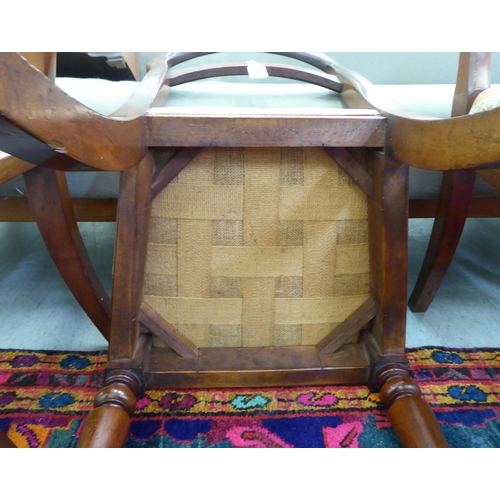 257 - A set of four Edwardian mahogany framed bar back dining chairs, the later fabric upholstered cushion... 