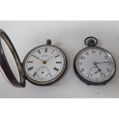 262 - A Waltham silver cased pocketwatch, faced by a Roman dial; and another, faced by an Arabic dial  mix... 