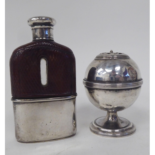 268 - A silver hip flask; and a silver pedestal pepper mill  mixed marks