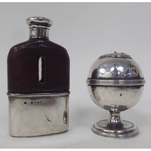 268 - A silver hip flask; and a silver pedestal pepper mill  mixed marks