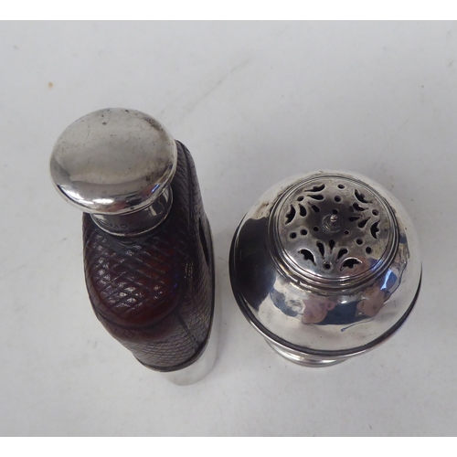 268 - A silver hip flask; and a silver pedestal pepper mill  mixed marks