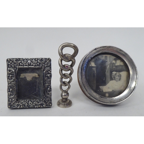 269 - Small instruments, silver and other collectables: to include a pocket barometer; and brass key chain... 