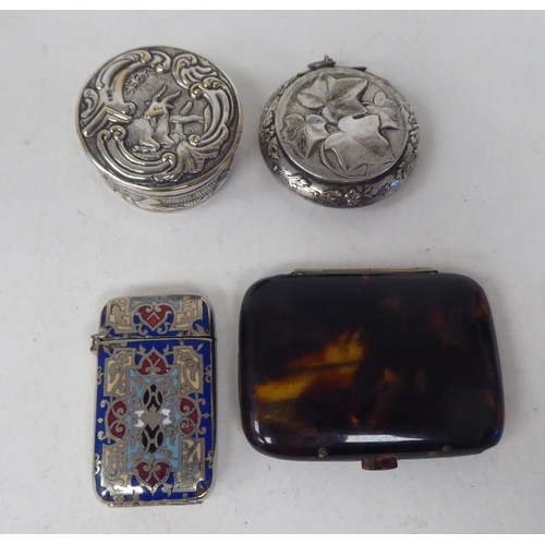 269 - Small instruments, silver and other collectables: to include a pocket barometer; and brass key chain... 