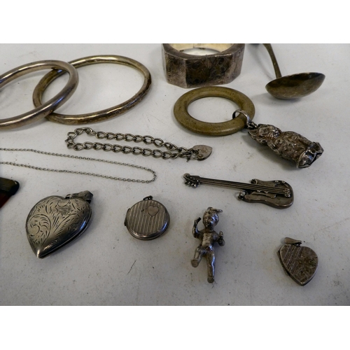 279 - Mainly silver and white metal items of personal ornament and collectables: to include a hinged brooc... 