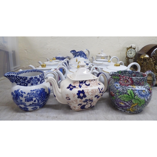 282 - Patterned and branded china teapots and jugs 