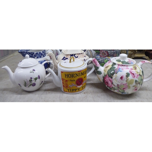 282 - Patterned and branded china teapots and jugs 