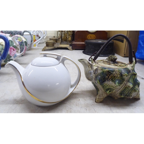 282 - Patterned and branded china teapots and jugs 