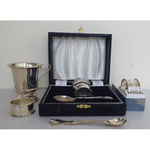 319 - Silver collectables: to include a presentation Christening egg cup and spoon  mixed marks ... 