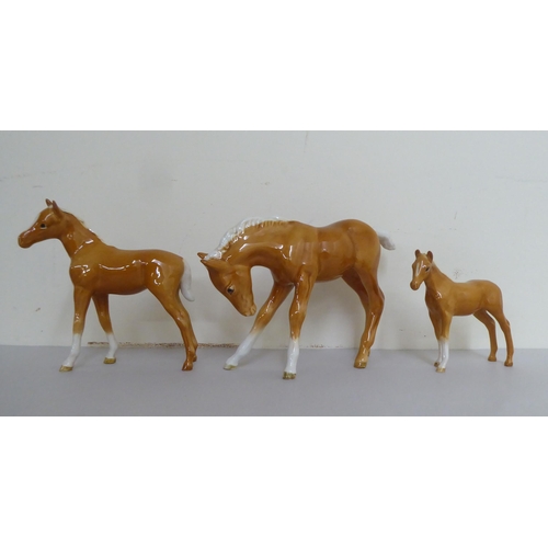 320 - A group of five Beswick china horses/foals, each in brown tan with white  manes  largest 6... 