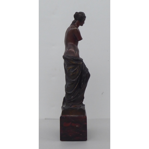 76 - A modern bronze figure 'Venus de Milo', on a marble plinth  12