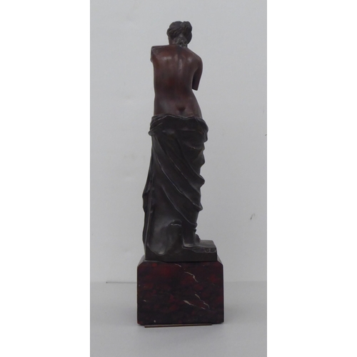 76 - A modern bronze figure 'Venus de Milo', on a marble plinth  12