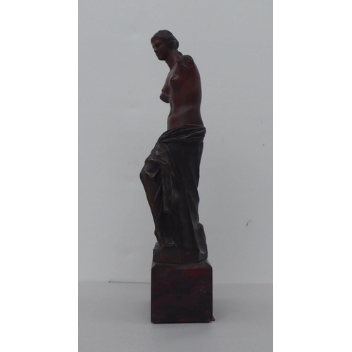 76 - A modern bronze figure 'Venus de Milo', on a marble plinth  12