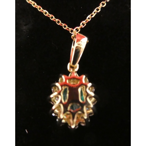 90 - An 18ct gold, diamond and emerald set pendant, on a fine neckchain