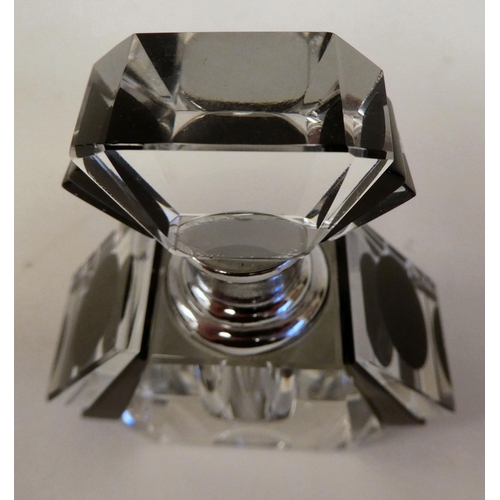 97 - An Art Deco inspired black enamel and clear glass scent bottle and stopper 