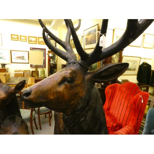 26 - A modern cast bronze model, a one piece stag  94