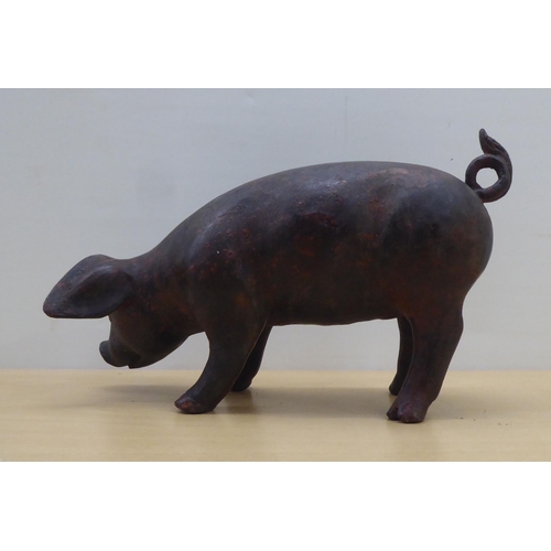 60 - A cast bronze model, a piglet  6.5