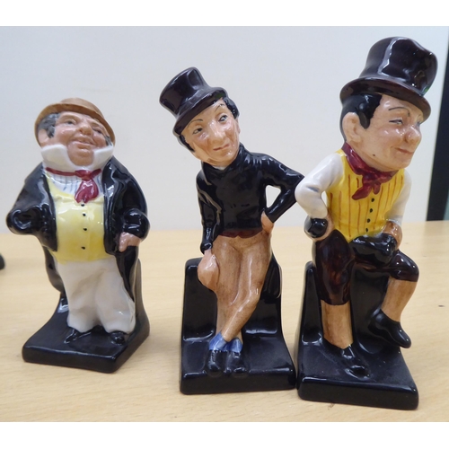 75 - Twenty-four Royal Doulton china figures from 'Oliver' and other Dickens figures  largest 4