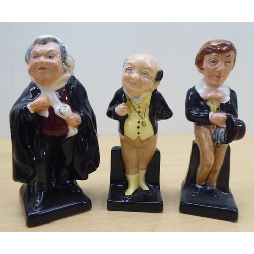 75 - Twenty-four Royal Doulton china figures from 'Oliver' and other Dickens figures  largest 4