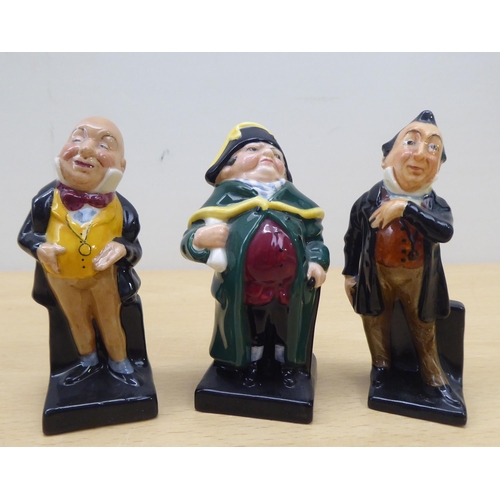 75 - Twenty-four Royal Doulton china figures from 'Oliver' and other Dickens figures  largest 4