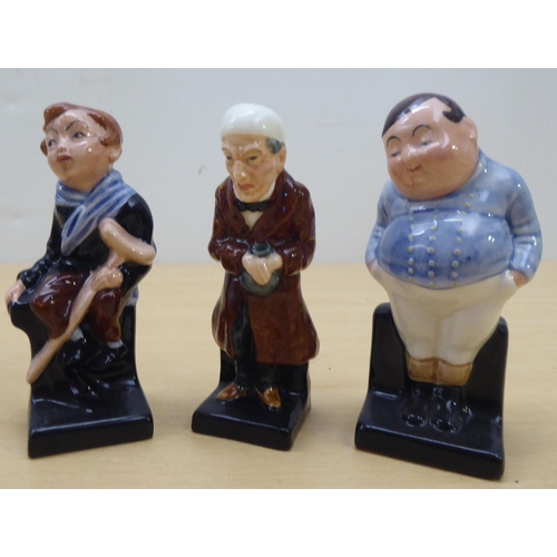 75 - Twenty-four Royal Doulton china figures from 'Oliver' and other Dickens figures  largest 4