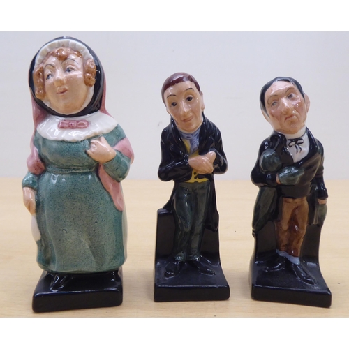 75 - Twenty-four Royal Doulton china figures from 'Oliver' and other Dickens figures  largest 4