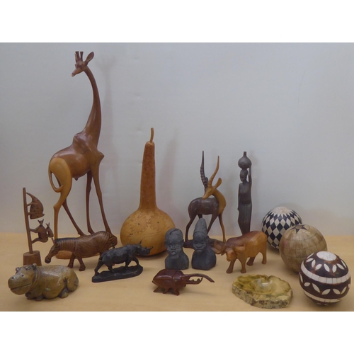 83 - 20thC wooden and other carvings: to include figures and model animals  largest 24