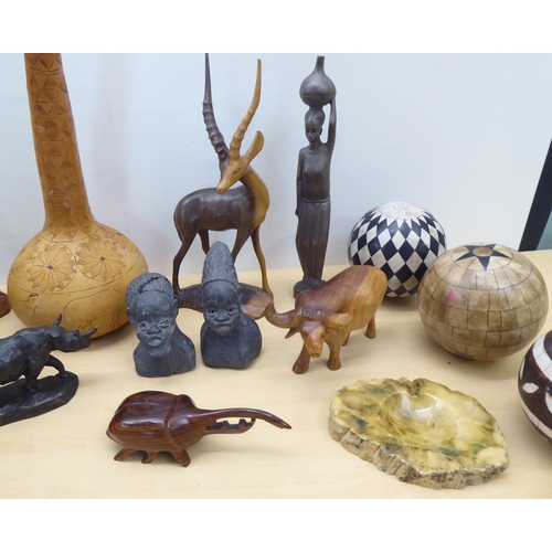 83 - 20thC wooden and other carvings: to include figures and model animals  largest 24