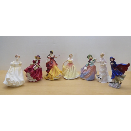 93 - Seven Royal Doulton china figures: to include 'Autumn Breezes'  HN1911  7