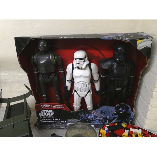 104 - Toys and related collectables: to include a Star Wars Rogue Action figure set  boxed