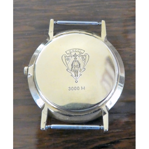 106 - Watches: to include a Raymond Weil gold plated bracelet watch, faced by a baton dial