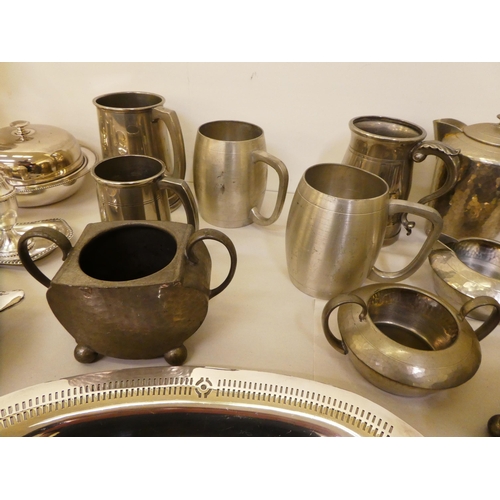 122 - Silver plated and pewter tableware: to include spot hammered Tudric teaware