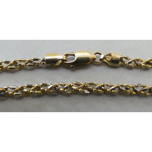 125 - Three various fancy 9ct gold bracelets: to include a ropetwist example, on a ring bolt clasp
