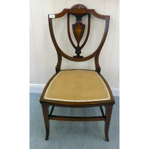 13 - A late Victorian mahogany hanging bookcase, incorporating a central cupboard  30