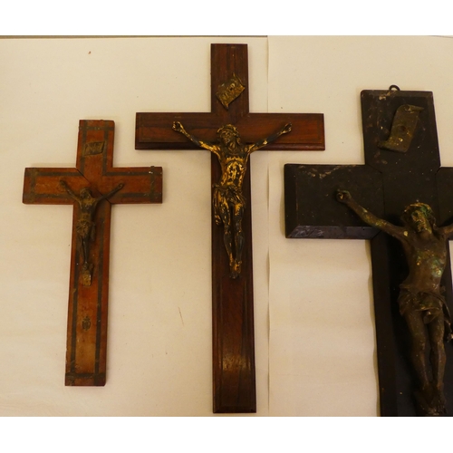136 - Six dissimilar crucifixes with variously cast metal Corpus Christi  largest 24
