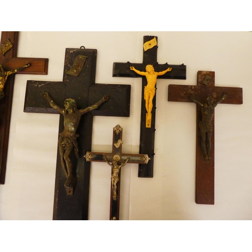136 - Six dissimilar crucifixes with variously cast metal Corpus Christi  largest 24