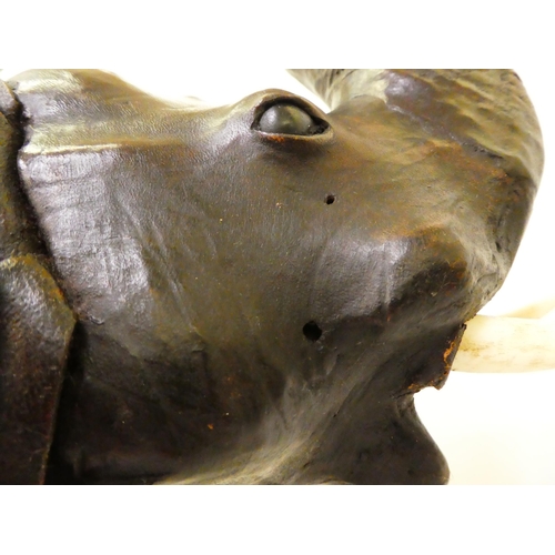 137 - A Liberty's inspired, moulded and stained leather model, a trumpeting elephant&nbsp; 21